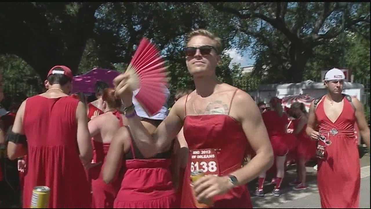 woman in red dress running