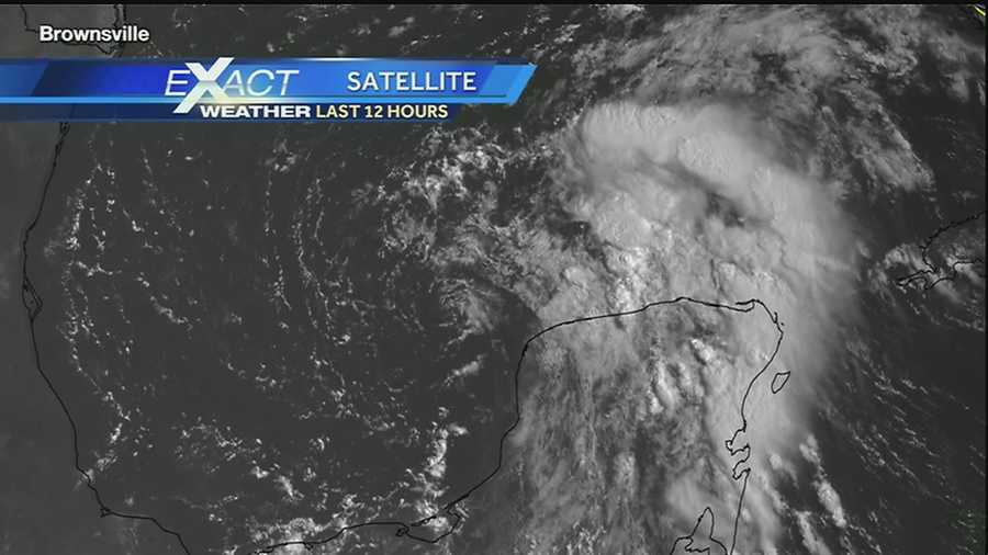 Invest 92L has a 50 percent chance of development, which hasn't changed in the past 24 hours. Visible satellite imagery of Invest 92L shows a hints as to a center of circulation.