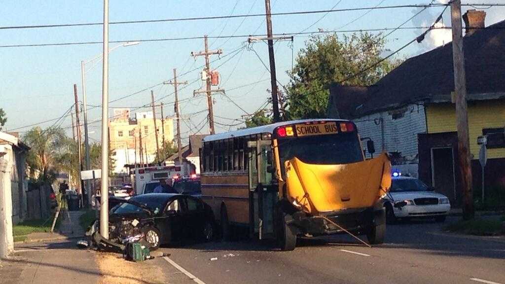 Students taken to hospital after car crashes into school bus in 9th Ward