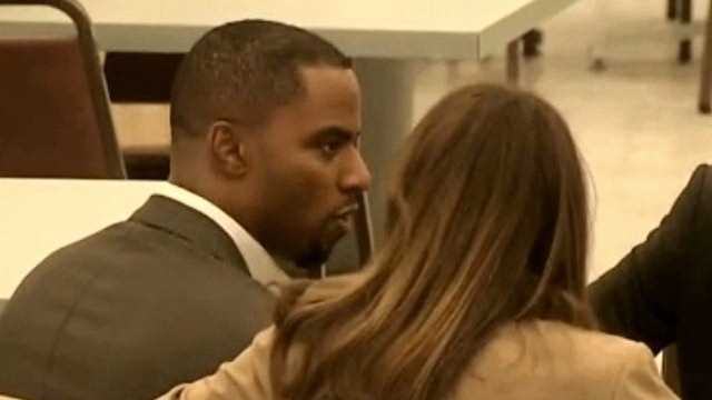 Darren Sharper meets with his attorney during a recent court appearance in Los Angeles.