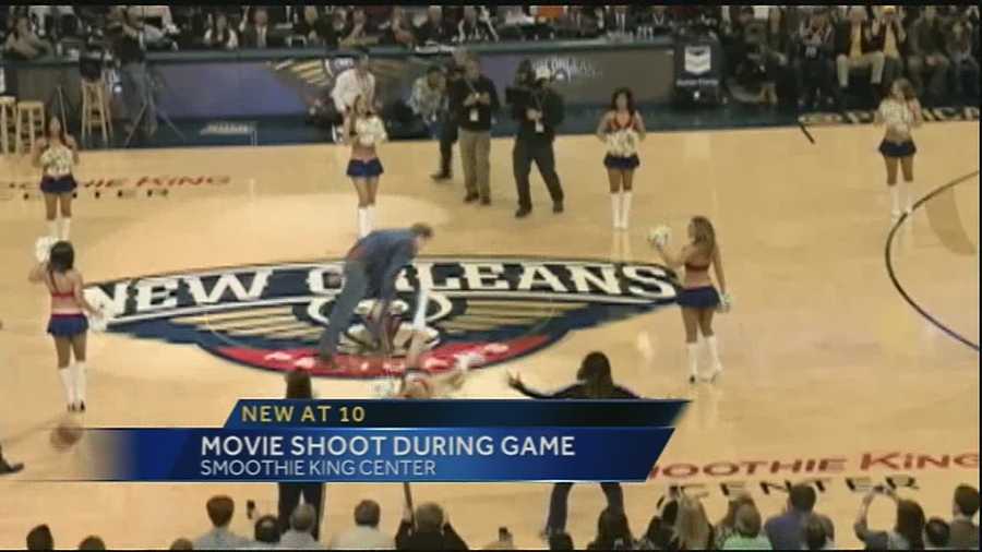 Actors Will Ferrell and Mark Wahlberg attended the New Orleans Pelicans backetball game for a movie shoot. As part of the shoot, Ferrell launches a ball at an actress playing a cheerleader during halftime.