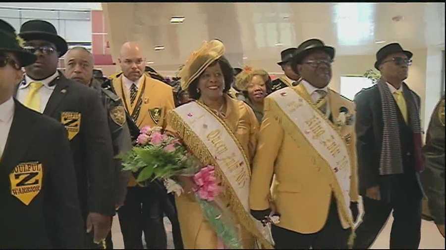 Champagne, flowers and a brass band at the Louis Armstrong New Orleans International Airport could only mean one thing: the arrival of the Queen of Zulu.
