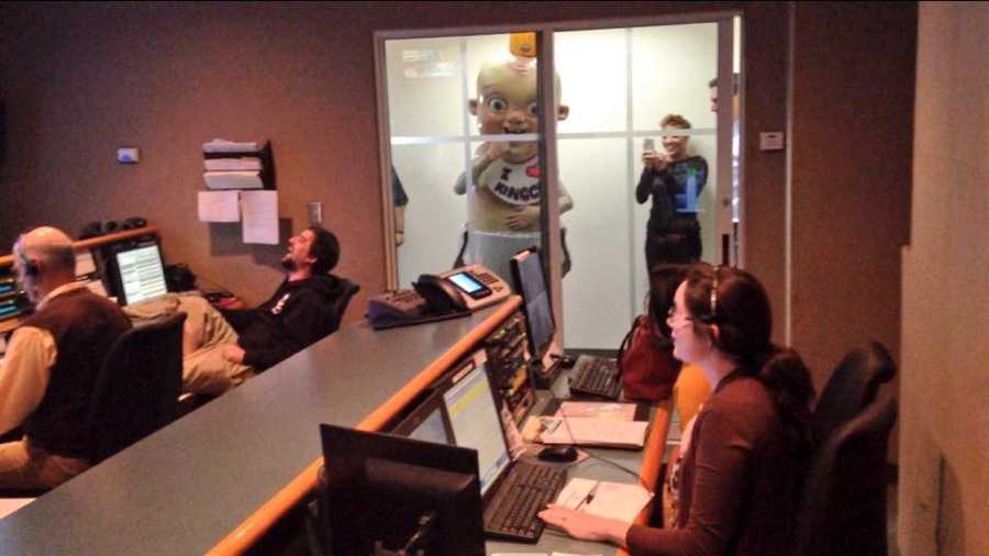King Cake Baby makes the rounds to media outlets Tuesday, terrifying WDSU staffers.
