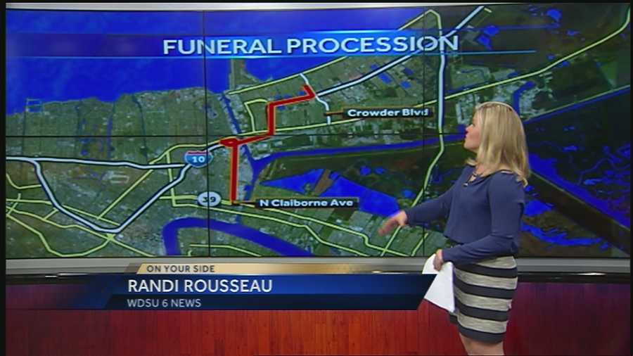 Ramdi Rousseau goes over the funeral procession route for NOPD Officer Daryle Holloway.