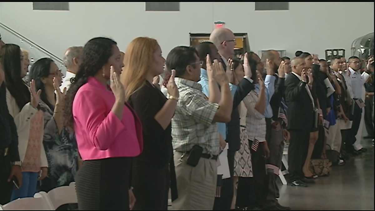 Fifty U.S. citizens in naturalization ceremony at WWII Museum