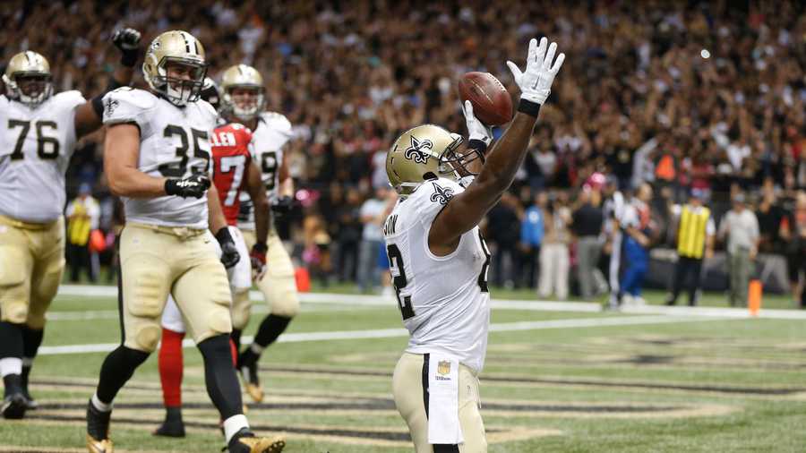 New Orleans Saints tight end Benjamin Watson (82) celebrates his touchdown catch against the Atlanta Falcons during the second half of an NFL football game, Thursday, Oct. 15, 2015, in New Orleans.