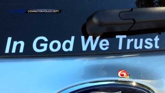 Covington police vehicles now sport a sticker reading "In God We Trust"