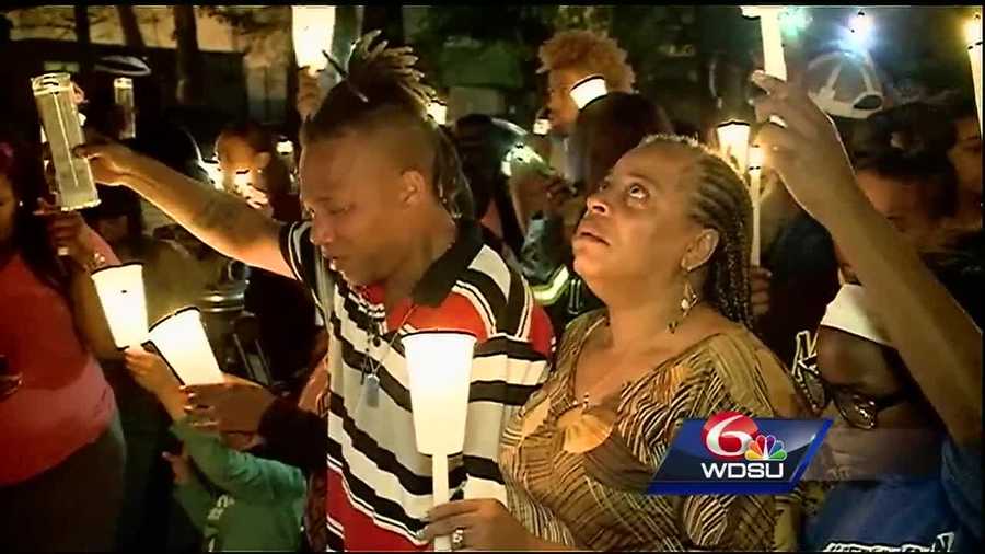 Two families mourned the loss of two people killed in a home in Kenner.