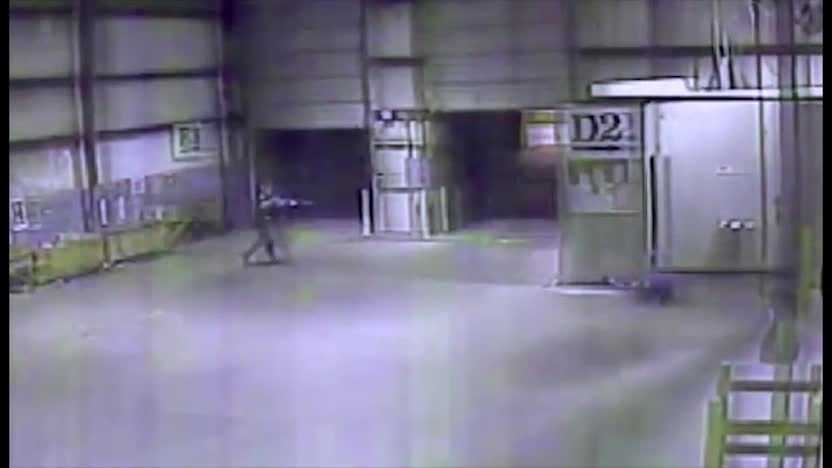 Surveillance video from inside the Times-Picayune warehouse in Metairie shows the moment a Jefferson Parish fatally shot a man who officials said pointed a gun at him.
