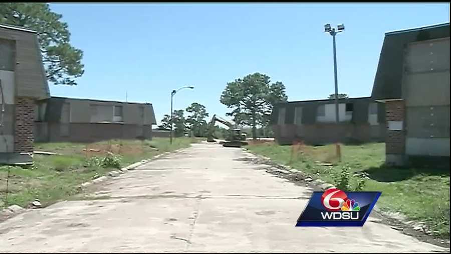 Demolition is underway at the old Versailles Arms Apartments off Dwyer Boulevard in New Orleans East. Developers plan to build 400 units of affordable, mixed-income rental housing. It is a $53 million project that developers say is helping to revitalize that community, but some residents are not happy with the plans.