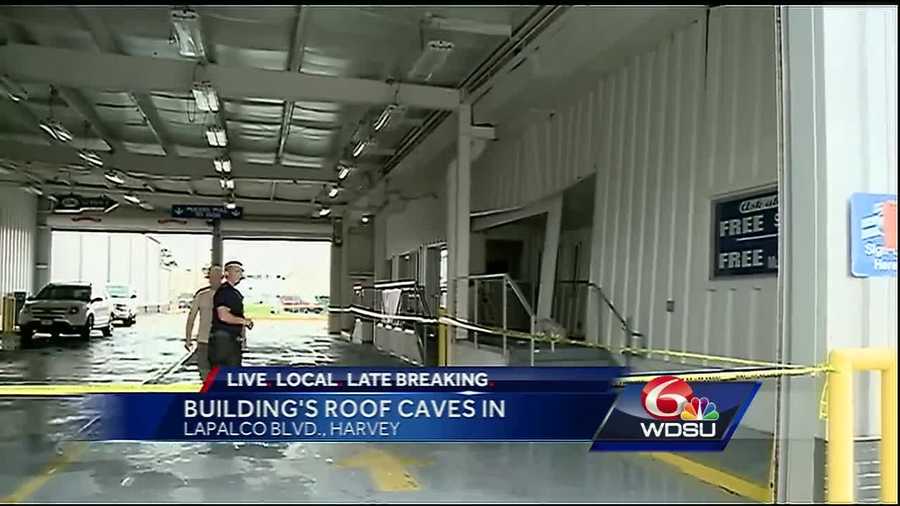 intense-rain-blamed-for-partial-roof-collapse-at-harvey-car-dealership