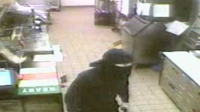 Robber caught on camera holding up Dunkin Donuts