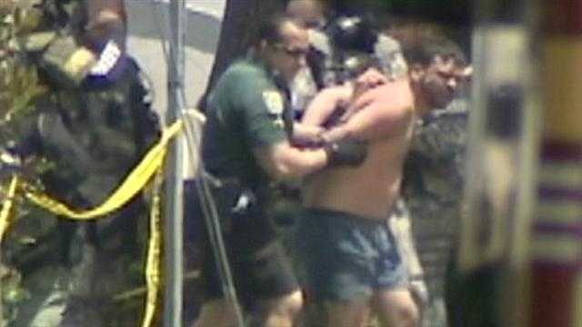Man arrested after SWAT team surrounds Orange Co. home