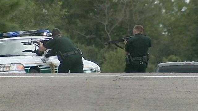 Three men were taken into custody after a home invasion and a bank robbery in Volusia and Seminole counties.