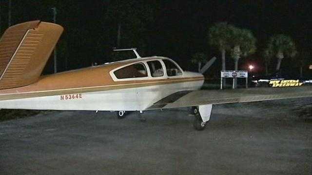 A private plane makes an emergency landing on a highway near the New Smyrna Beach Speedway.