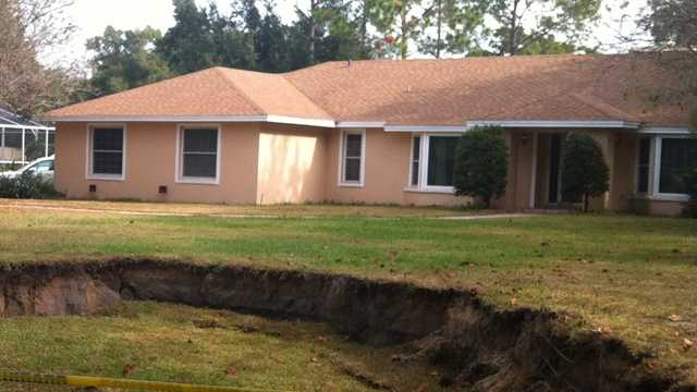 Photos: 50-foot sinkhole opens up in Windermere