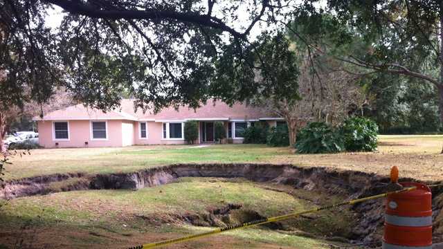 Photos: 50-foot Sinkhole Opens Up In Windermere