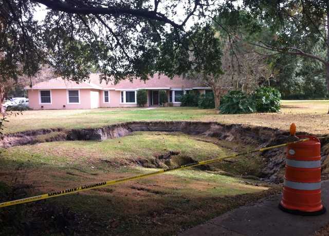 Photos: 50-foot sinkhole opens up in Windermere