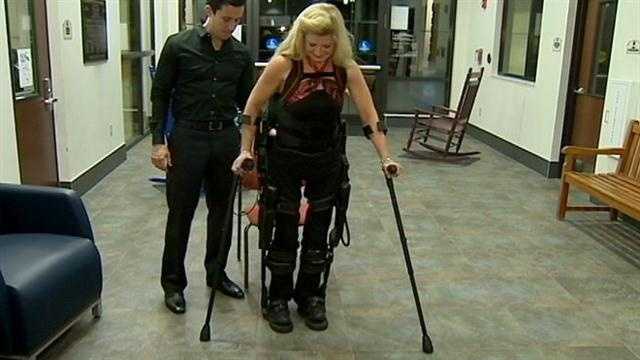 A woman who says she only dreamt of walking again one day after a skiing accident is making strides, thanks to a new bionic suit.