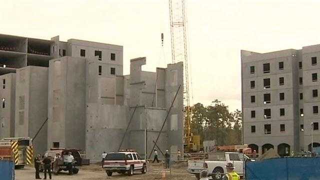 Four construction workers were taken to the hospital after a concrete slab fell on them in Seminole County.