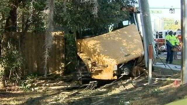 A school bus hit a power pole Tuesday after running a red light, according to the Florida Highway Patrol.