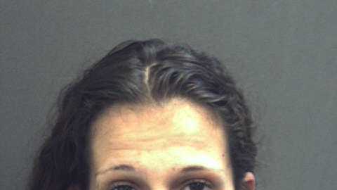 Woman accused of leaving infant in locked car