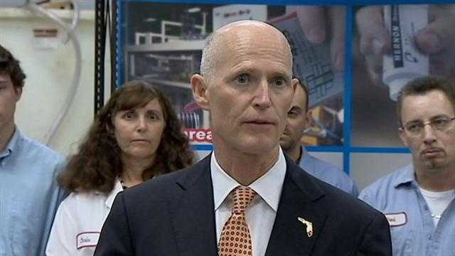 Gov. Rick Scott is using a local business to jump start his push to eliminate yet another business tax.