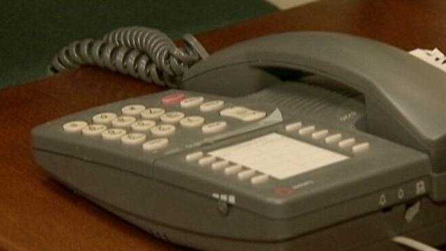 New details about a phone scam that triggered what some thought was a bank robbery were released Friday.
