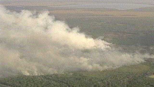 A prescribed burn in Volusia County jumped the line and firefighters worked to put it out Monday.