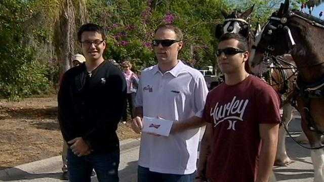 A NASCAR driver gives two Marines from Ormond Beach tickets to the Daytona 500.