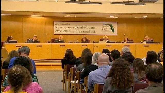 Angry parents are suing the Brevard County School Board over the planned closure of three schools.