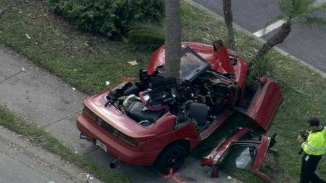 Images: Car split after crash into tree