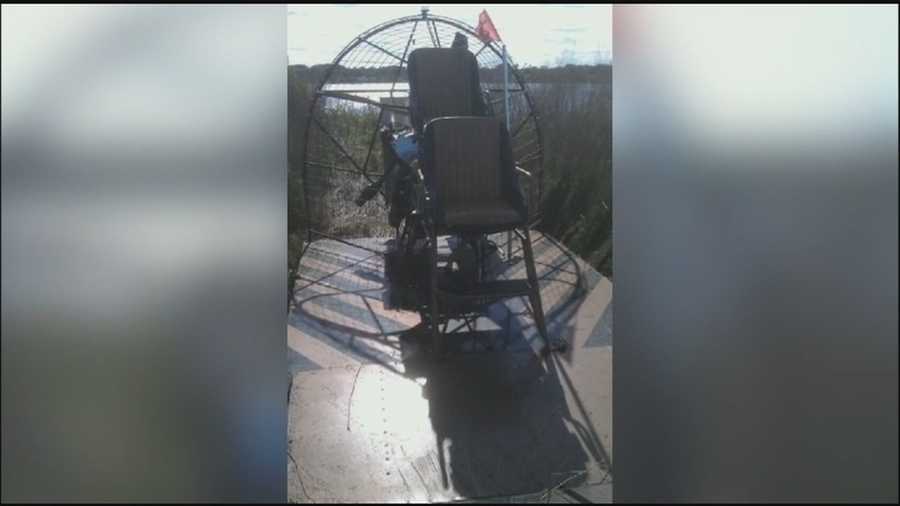 Investigators say two men used an airboat to purposely crash into a car.