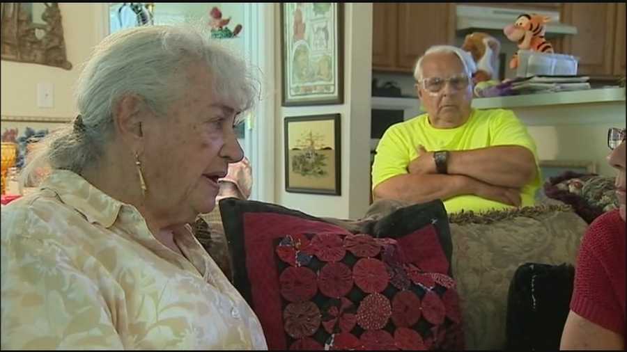 A woman denied she hit her neighbors with a walking cane.
