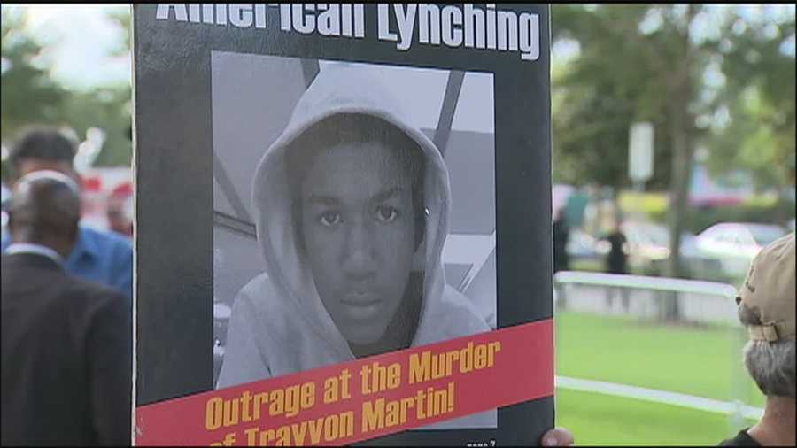 Protesters gathered in Sanford on Monday at the start of the jury selection process in the George Zimmerman trial.