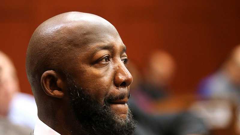 Tracy Martin, the father of slain teen Trayvon Martin, listens to a prospective juror in the George Zimmerman trial in Seminole circuit court on the 3rd day, in Sanford, Fla., Wednesday, June 12, 2013. Zimmerman is accused in the fatal shooting of Trayvon Martin. (Joe Burbank/Orlando Sentinel)