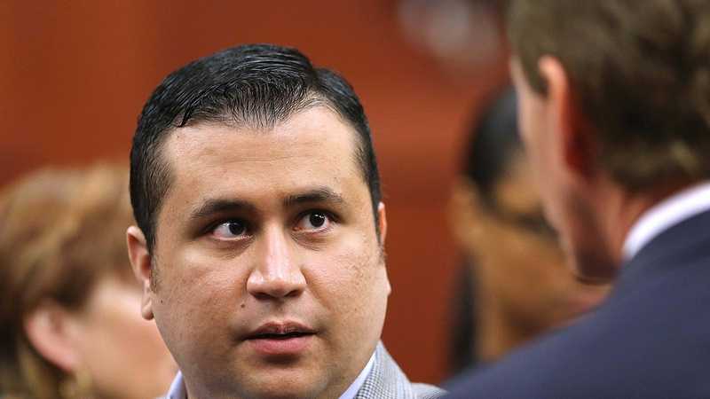George Zimmerman talks to his attorney, Mark O'Mara, during a recess in Seminole circuit court on the 6th day of his trial, in Sanford, Fla., Monday, June 17, 2013. Zimmerman is accused in the fatal shooting of Trayvon Martin. (Joe Burbank/Orlando Sentinel)