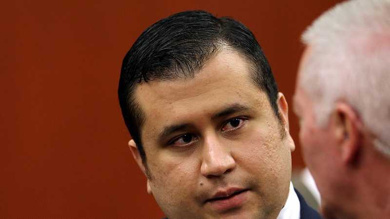 George Zimmerman talks to court personnel during the 15th day of his trial in Seminole circuit court, in Sanford, Fla., Friday, June 28, 2013. Zimmerman is accused in the fatal shooting of Trayvon Martin. (Joe Burbank/Orlando Sentinel/POOL)