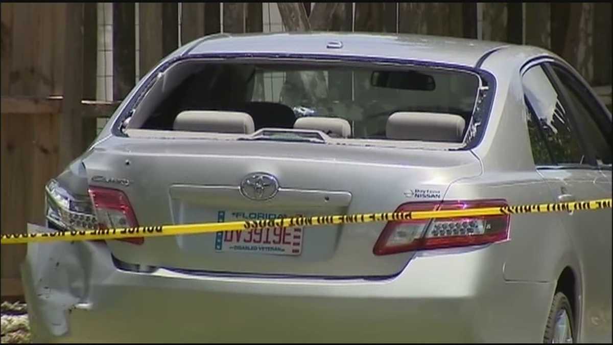 Suspect shot after driving car at officers, police say
