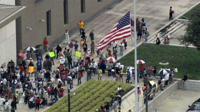 A rally is held to support Trayvon Martin at the Federal Courthouse in Orlando.