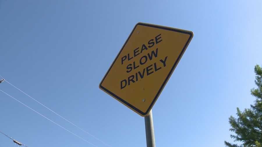 A sign on private property that reads "Please Slow Drively" has gained national attention.