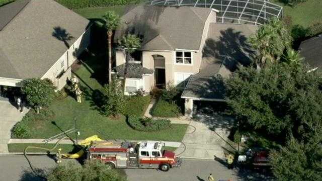 Photos: Flames shoot from Orange County home