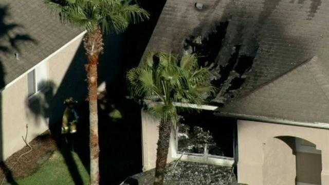 Photos: Flames shoot from Orange County home