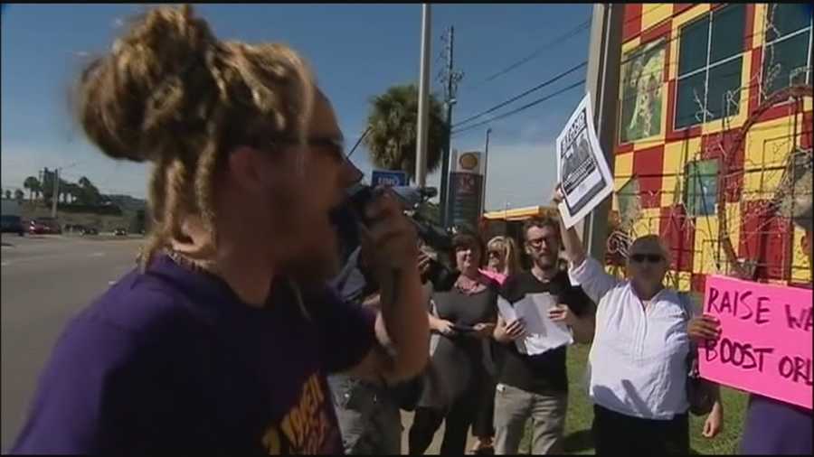 Fast food workers wanting higher wages protested in Orlando Thursday.