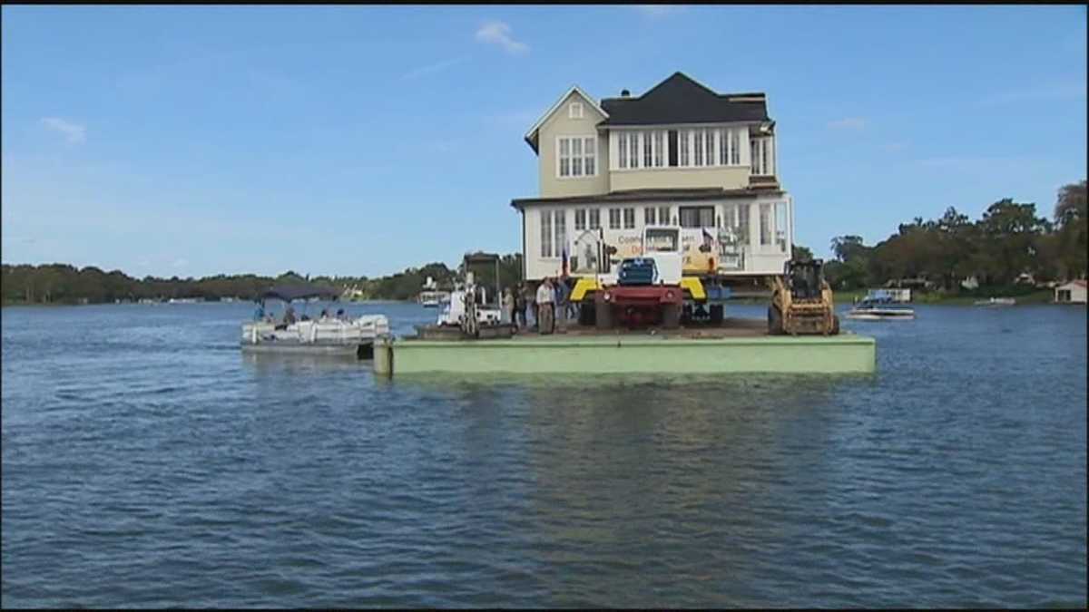 Half of Capen House moves across lake