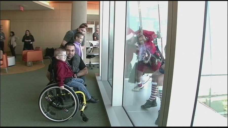 Santa and his elvers surprised some sick children stuck in an Orange County hospital this Christmas.