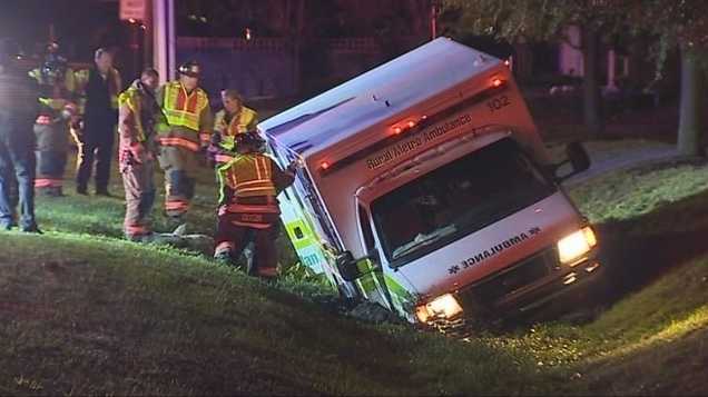 Ambulance with patient inside crashes into ditch