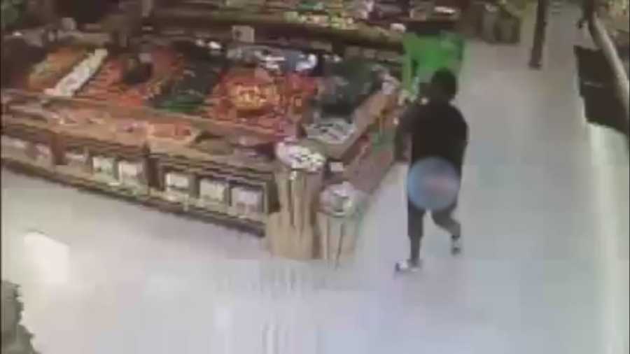 Authorities are looking for a woman who is accused of stealing two boxes of wine from a supermarket, and she wasn't wearing pants.