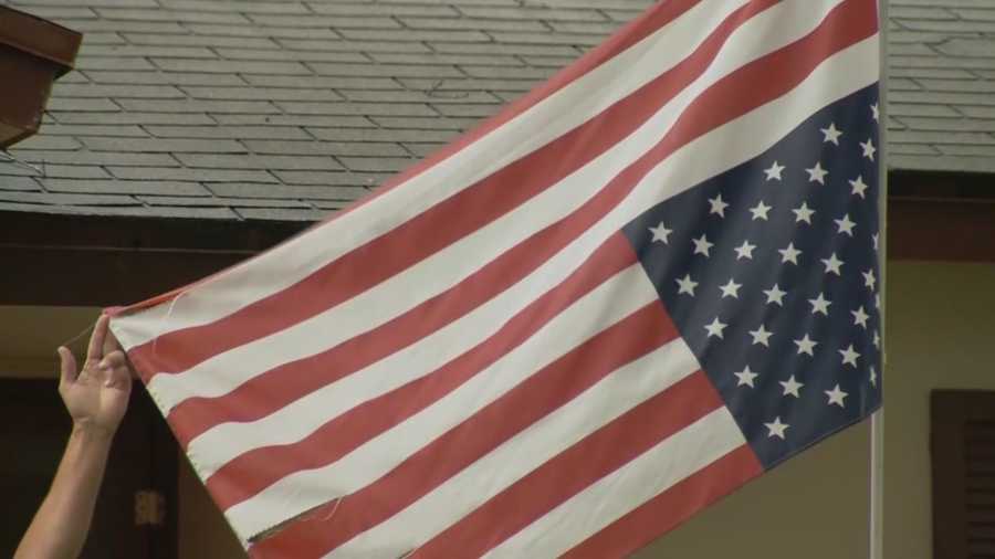 A Central Florida man turned his American flag upside down in protest of political decisions, but his neighbors say there are better ways for the man to share his opinions.