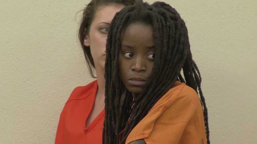 A judge has set a reduced the bond of $7,500 for Aisha Gillis, who is accused of attacking two family members with a machete at a family gathering near Daytona Beach.